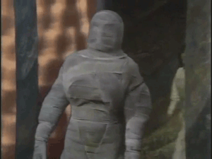 Tom and Lis walk into the room, spot a mummy, and immediately pivot in unison to walk out again!